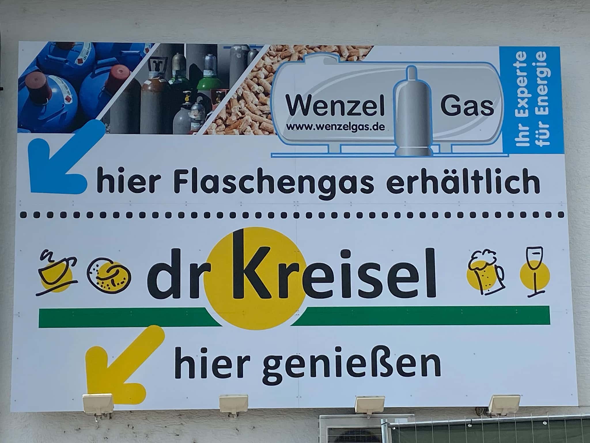Werbeschild für Flaschengas und Gastronomie